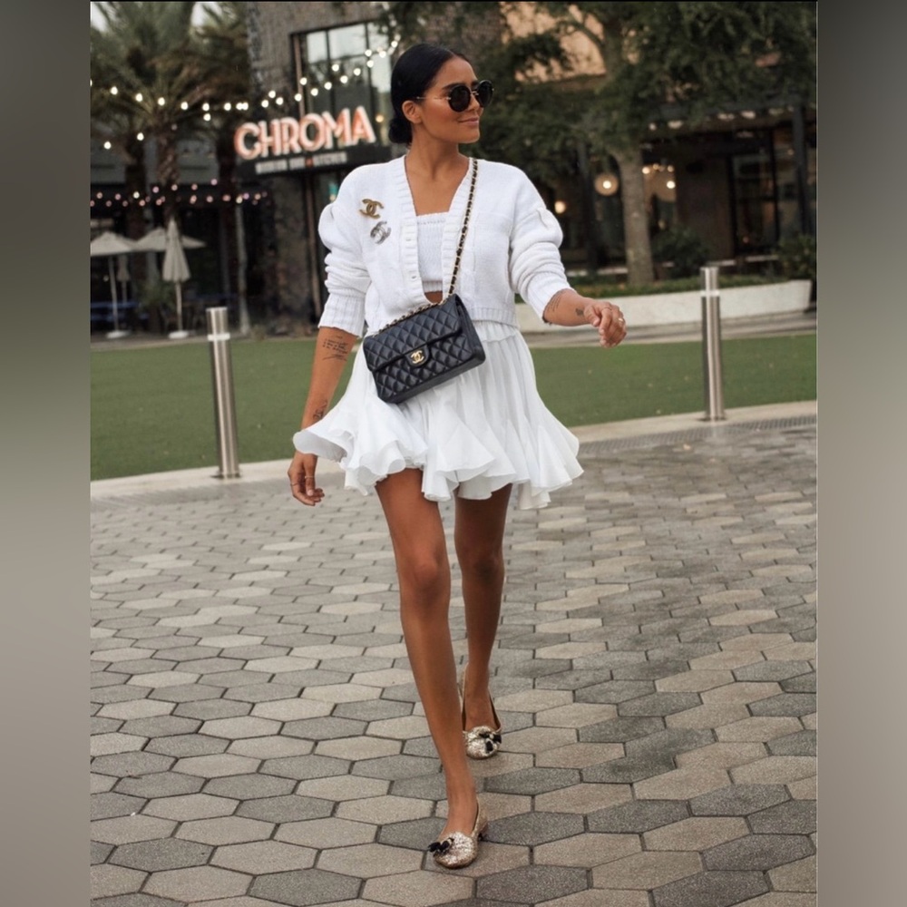 White skirt with shorts underneath, size Small